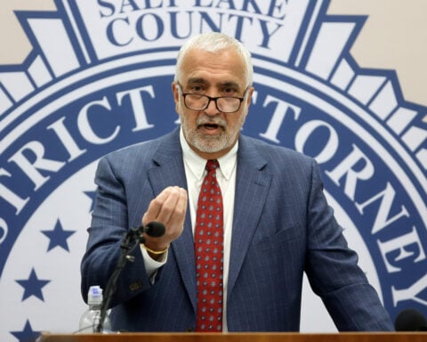 Safety volunteer charged in the fatal shooting of a Utah 'No Kings' protester