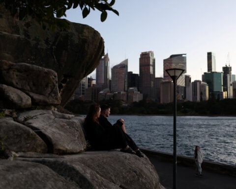 Australia's household spending surges, lifting rate hike bets