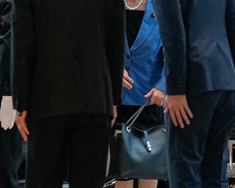 Japan's Takaichi is winning fans not with politics but with her style and 'work, work, work' mantra