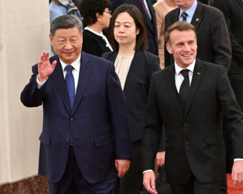 China's Xi and France's Macron pledge cooperation on global crises and trade
