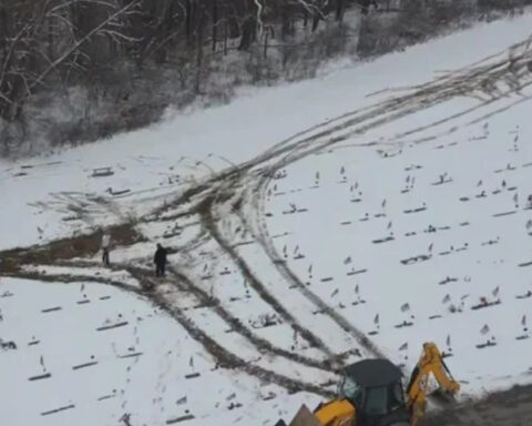 People upset after crews drove heavy machinery over headstones and graves at cemetery