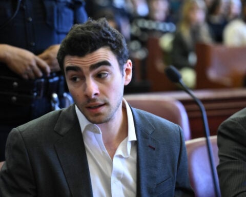 Police video shows Luigi Mangione said he didn't want to talk. They kept asking questions