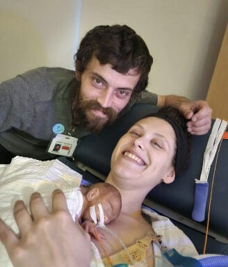 NICU baby's fighting spirit inspires family through medical challenges