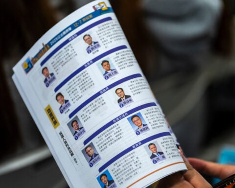 Hong Kong holds a legislative election Sunday after a fire raised governance concerns