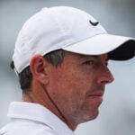 Rory McIlroy's late birdie burst means he'll be playing on the weekend at the Australian Open