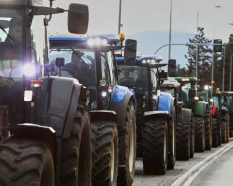 Greek police fire tear gas at protesting farmers threatening to blockade airport