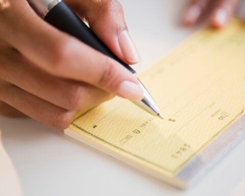 Could paper checks be on the way out, like the penny?