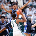 Cameron Boozer scores 18 in No. 4 Duke's 66-60 win over No. 7 Michigan State