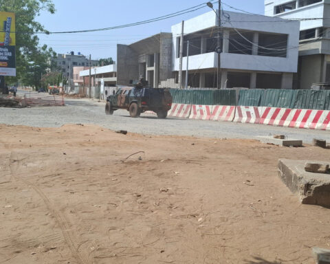 Benin's president condemns a foiled coup bid and says mutineers are 'fleeing'