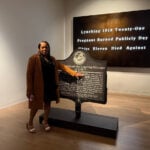 Bullet-pocked marker memorializing 1918 lynching goes on display in Atlanta