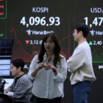 Asian shares are mixed ahead of Fed interest rate decision