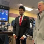Cancer survivor buys suits for McDaniel College football seniors