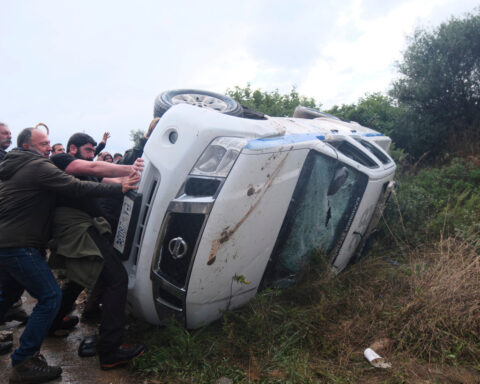 Protesting Greek farmers swarm onto airport tarmac in Crete, forcing halt to flights