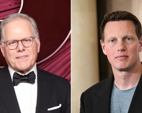 What is a hostile takeover bid?