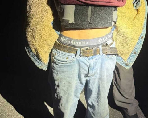 Christmas parade scare: Suspicious man detained, found armed with gun and dagger