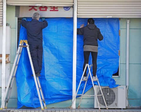 Japan assesses damage from 7.5 magnitude quake that injured 33