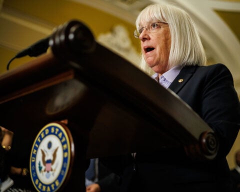 Senator calls for release of man detained by federal agents after he was attacked by a patrol dog