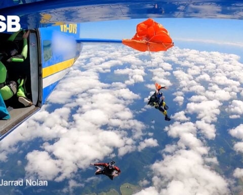 Australian skydiver’s parachute became caught on plane tail 15,000 feet in the air, video shows