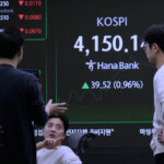Asian shares track US stock market's rise to record highs despite AI bubble worries
