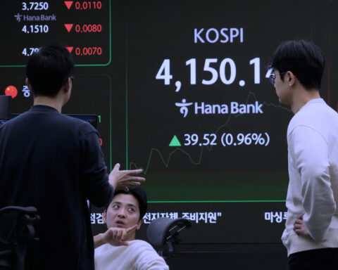 Asian shares track US stock market's rise to record highs despite AI bubble worries