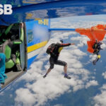 Skydiver dangles at 15,000 feet after parachute catches on plane's tail in Australia