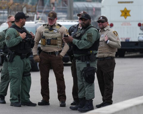 Court blocks the release of hundreds of immigrants arrested in a Chicago-area crackdown