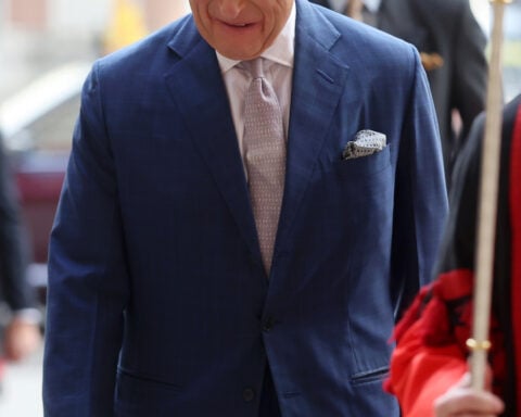 King Charles III says his cancer treatment is being reduced as he promotes benefits of screening