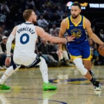 Curry scores 39 in return but Timberwolves top Warriors 127-120 without Edwards
