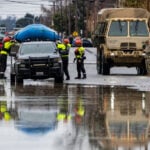 Arctic air plunges south as residents of the Pacific Northwest remain on guard after severe flooding