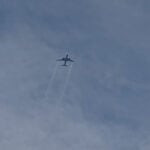 United flight to Tokyo returns to Dulles after losing power in an engine and igniting brush around runway