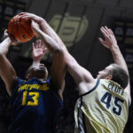 Oscar Cluff scores 22, Braden Smith reaches new milestone as No. 6 Purdue beats Marquette 79-59