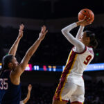 Azzi Fudd leads No. 1 UConn's 79-51 rout of 16th-ranked USC with JuJu Watkins looking on