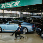 High-end car sales sink in China as its economy slows, taking a toll on European automakers