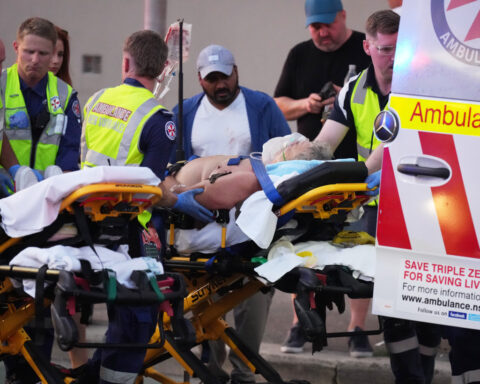 Bystander shown in videos disarming gunman during Australian beach shooting commended for bravery