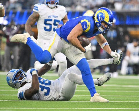 Matthew Stafford rallies Rams to 41-34 victory over Lions, clinching another playoff berth