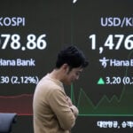 Asian shares slip after Wall Street logs its worst day in 3 weeks