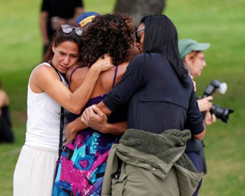The Bondi Beach shooting as seen from the beach, the boardwalk and a hotel
