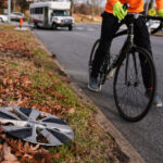 Baltimore cyclist finds joy in collecting lost hubcaps and stringing them into art