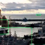 Ukraine says it struck Russian submarine at a port with underwater drones