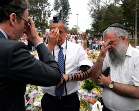 Australia's leaders promise to tighten gun laws after Bondi Beach massacre on Hanukkah