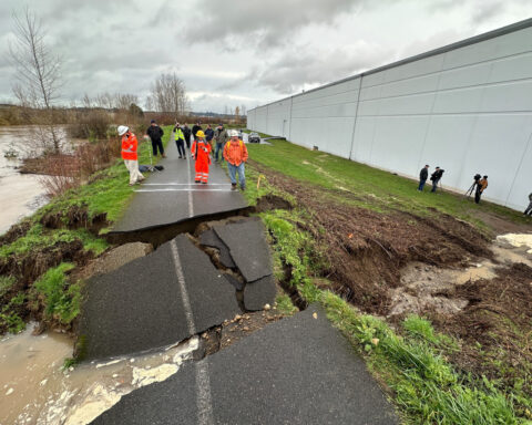 A driver is found dead in a submerged car near Seattle after a week of heavy rain and flooding