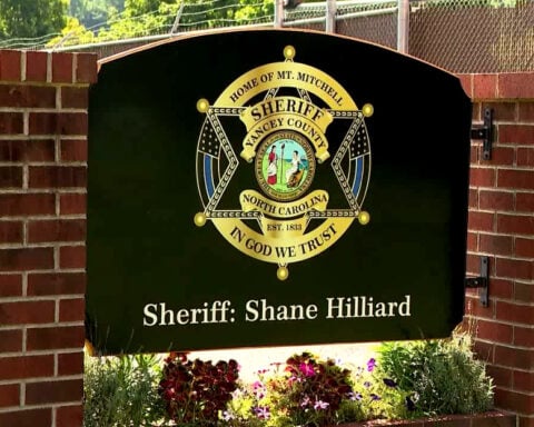 Suspect shot by deputy in standoff after pointing crossbow, sheriff says