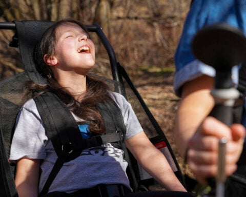 Doctors told a dad his daughter would never walk on her own. He built a way to get her on the trails.