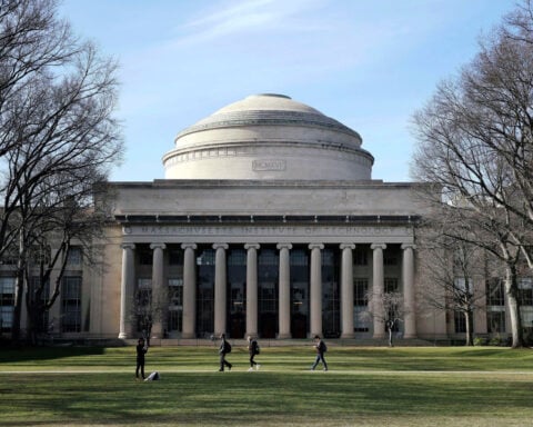 Authorities say they have no suspect in custody in the death of an MIT professor shot at home