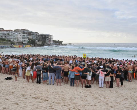 Millions are pledged to a Syrian Australian man who stopped a gunman and became a national hero