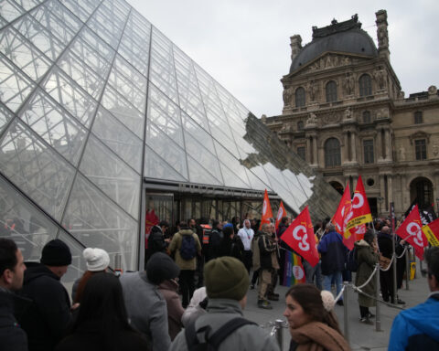 Louvre workers vote to extend a strike as the museum partially reopens
