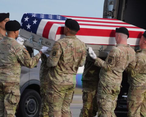 Trump pays respects to 2 Iowa National Guardsmen and interpreter killed in Syria as they return home