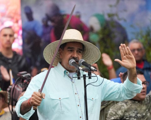 Some sanctioned oil vessels divert from Venezuela as Trump threatens blockade