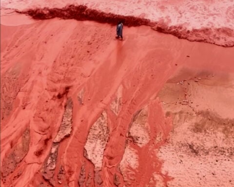 Rain creates a crimson spectacle on Iran's Hormuz Island for the first time this year