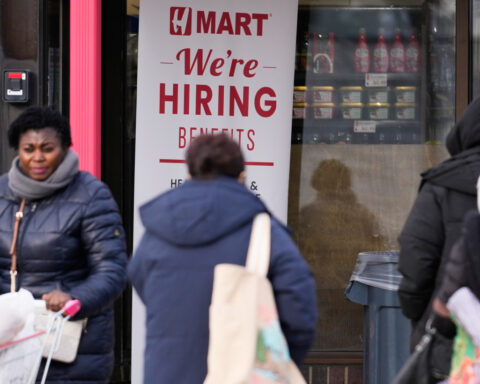 US jobless claim applications fell by 13,000 last week as layoffs remain low